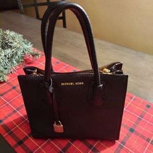 Michael Kors black leather purse.